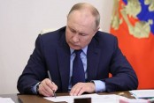 Putin signs decree to allow confiscation of US property